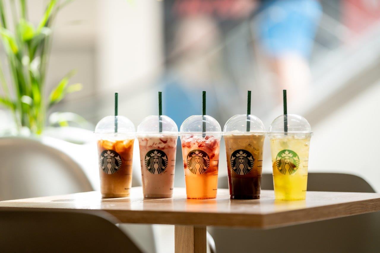 starbucks drinks at a window